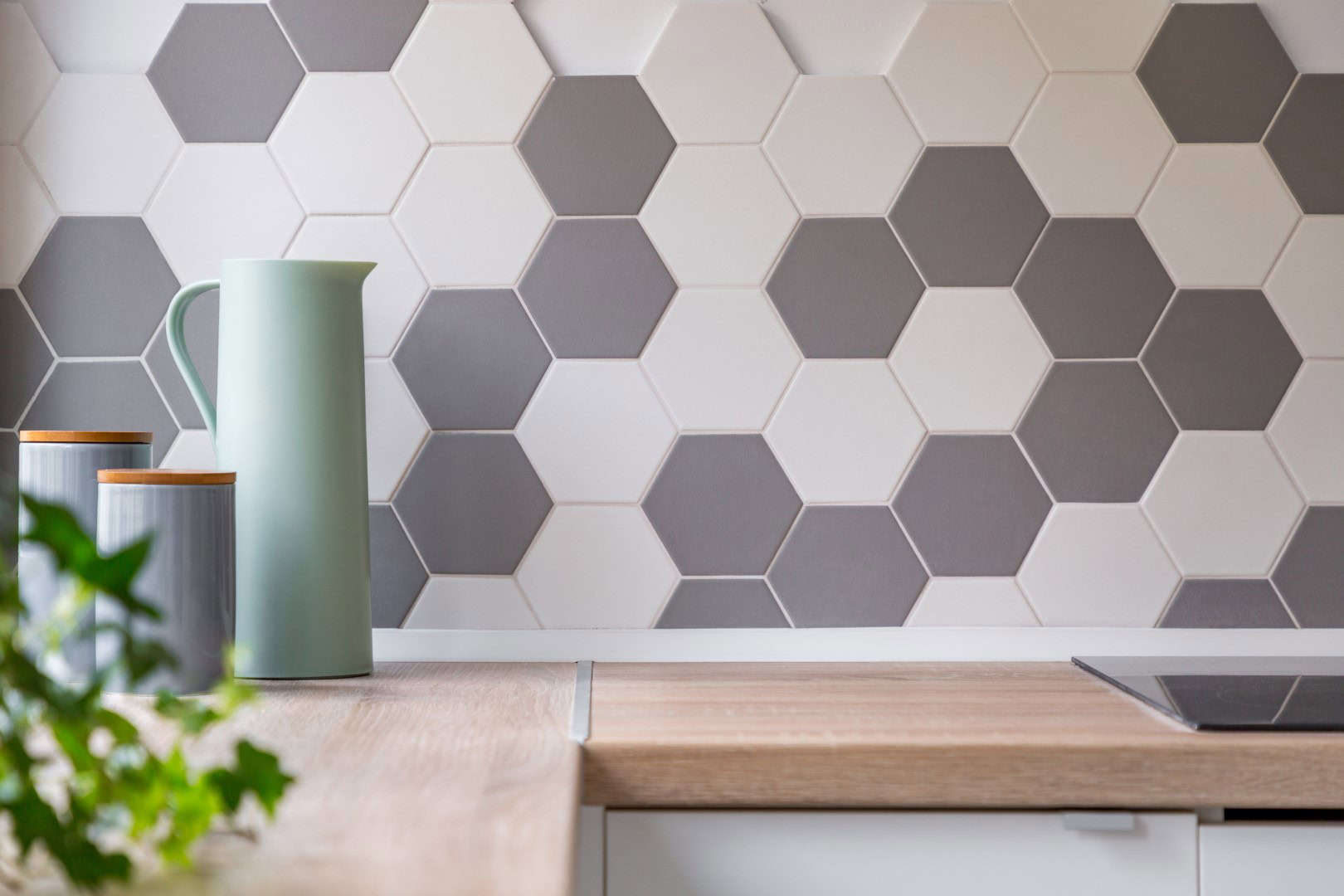 kitchen,with,grey,and,white,honeycomb,wall,tiles,and,wooden